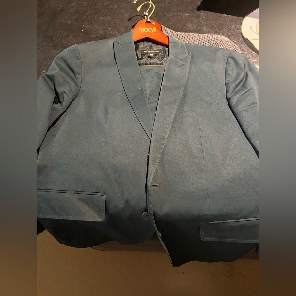 Men’s blue suit, jacket and pants